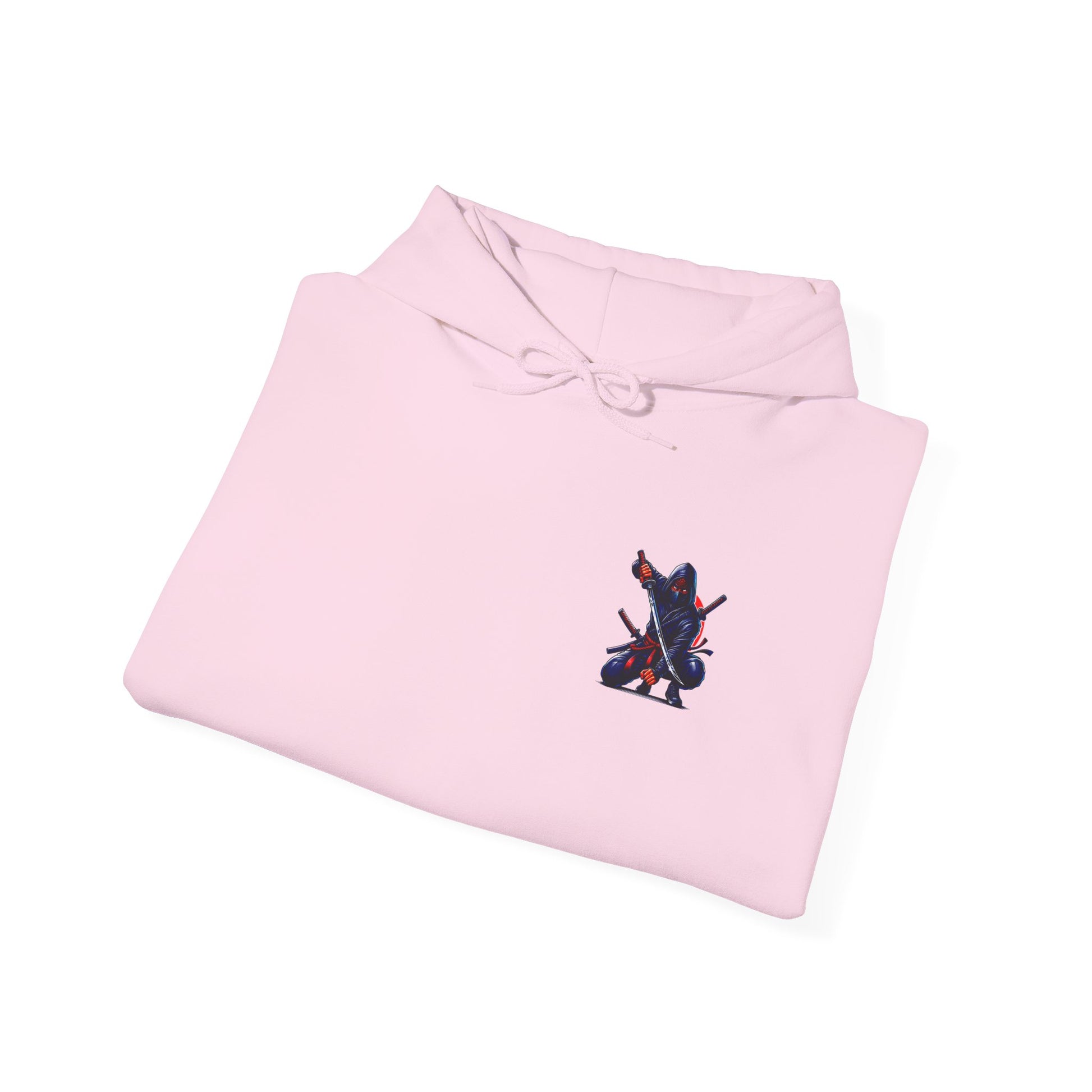 A light pink folded hoodie featuring a Crouching ninja with two katanas and "Bushido" text, red and black Japanese-inspired hoodie design.