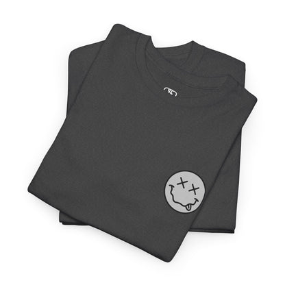 A folded heather gray t-shirt with a smiley face emoji on the front and the phrase “Everything Hurts and I am Hungry” in a retro font on the back.
