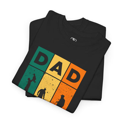 A folded black T-shirt with "DAD" letters, each letter showing a different stage of a father's life (lifting child, walking with child, old age).