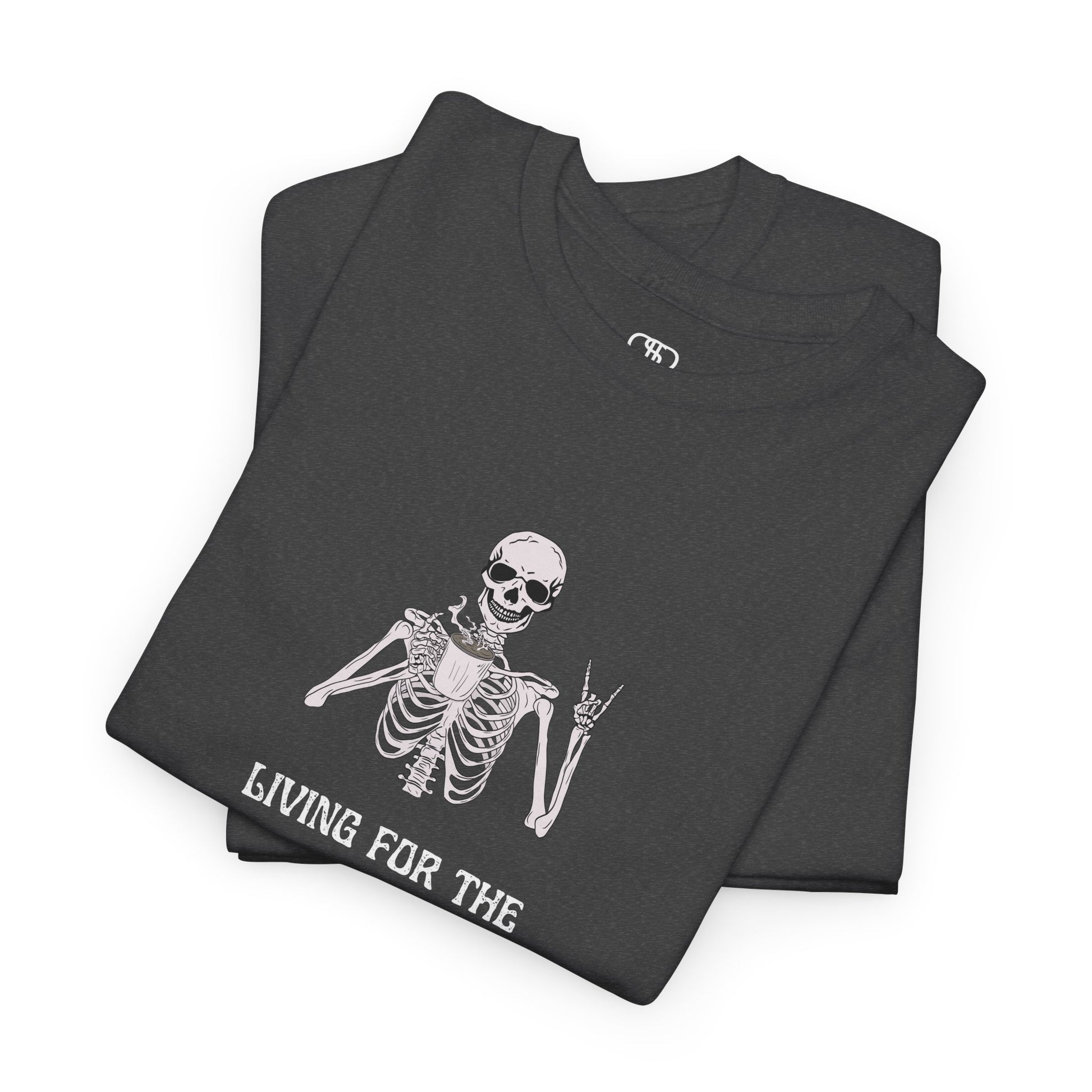 A folded heather gray T-shirt with a skeleton holding a hot coffee, displaying a rock hand symbol, and "Living For The Coffee" text.