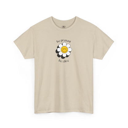 A vibrant yellow sunflower graphic on a t-shirt. The inspirational phrase “Be Present, Be Alive” is elegantly integrated into the design.