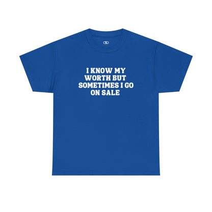 A [blue] t-shirt with the funny quote "I know my worth but sometimes I go on sale" printed in a clean, black font across the chest.