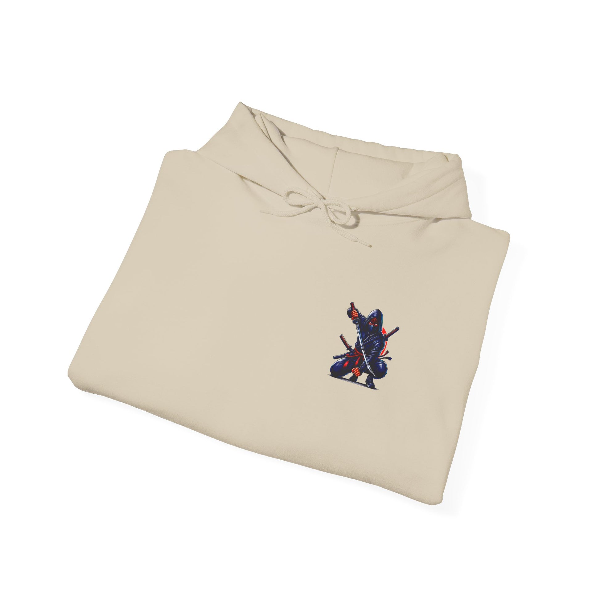 A folded sand hoodie featuring a Crouching ninja with two katanas and "Bushido" text, red and black Japanese-inspired hoodie design.