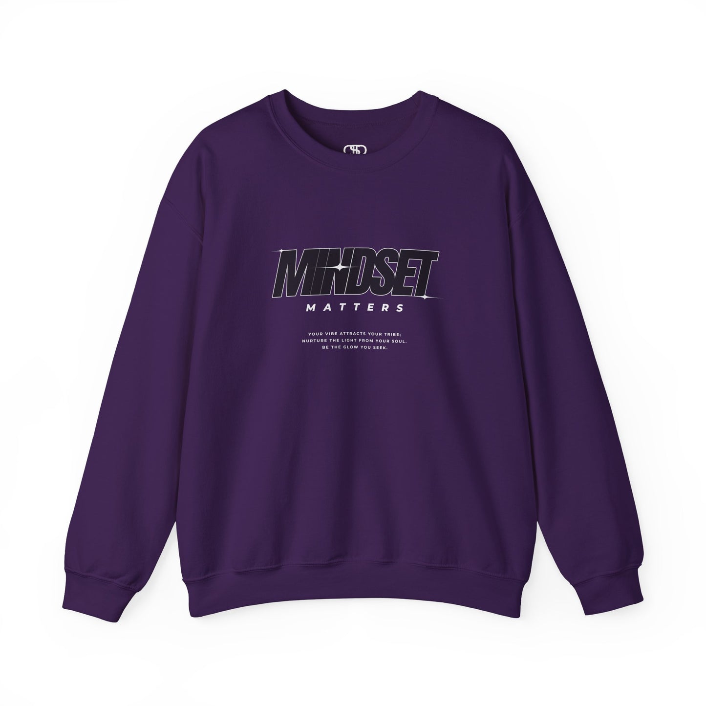 A purple sweater "Mindset Matters" text with stars on a sweater, inspirational quote below the main quote. 