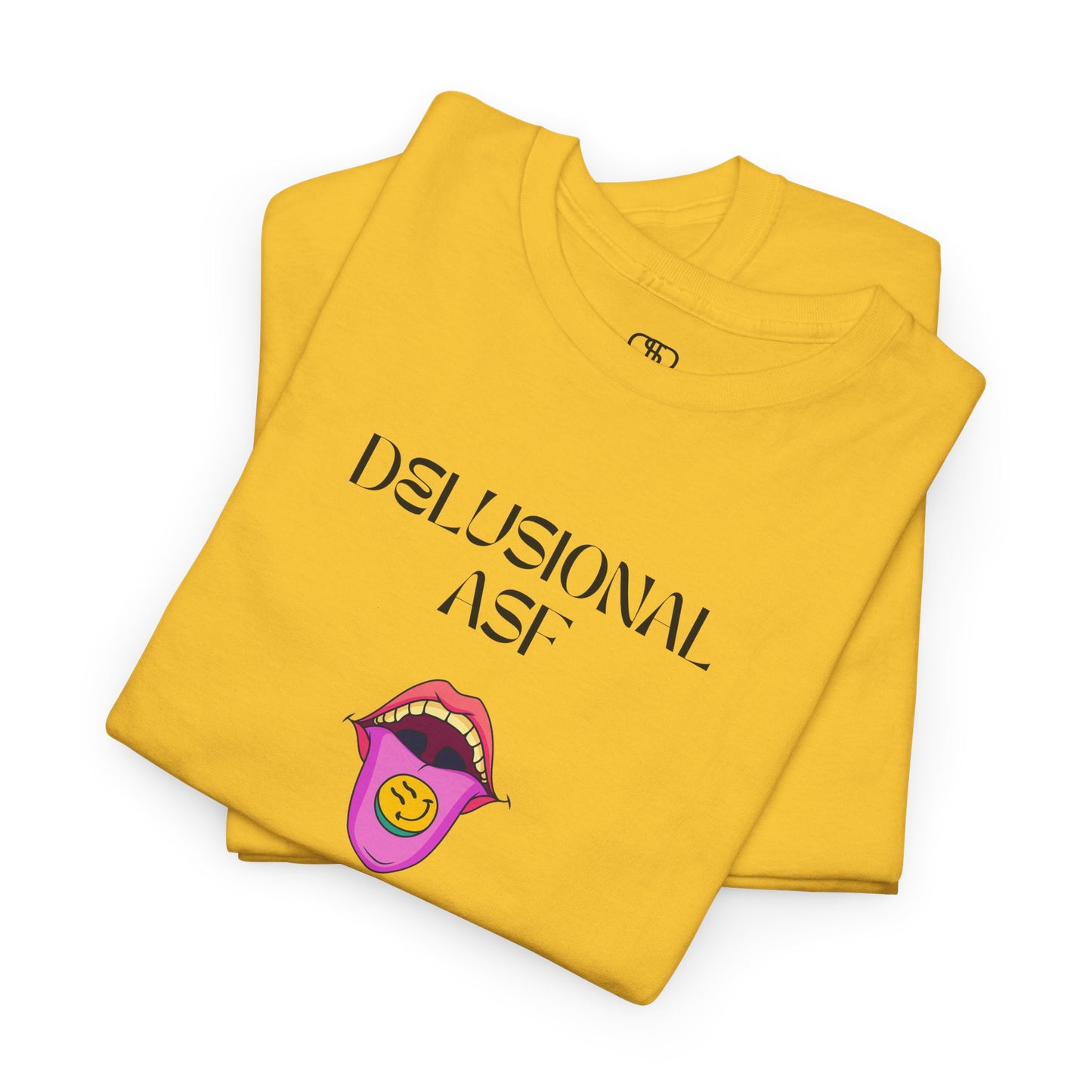 A folded daisy T-shirt with "Delusional asf" text, an open mouth graphic with tongue out, and a happy face emoji pill.