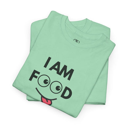 A mint green folded T-shirt with "I AM FOOD" text, where the 'OO' are cartoon eyes, and a tongue-out graphic.