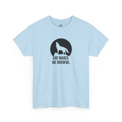 A light blue T-shirt with a wolf silhouette howling at the moon on a cliff, and "She makes me HOOWWL" text.