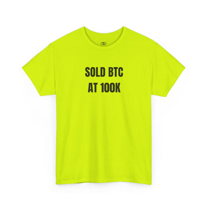 A SAFETY GREEN T-shirt with bold text "SOLD BTC At 100K" on the front.