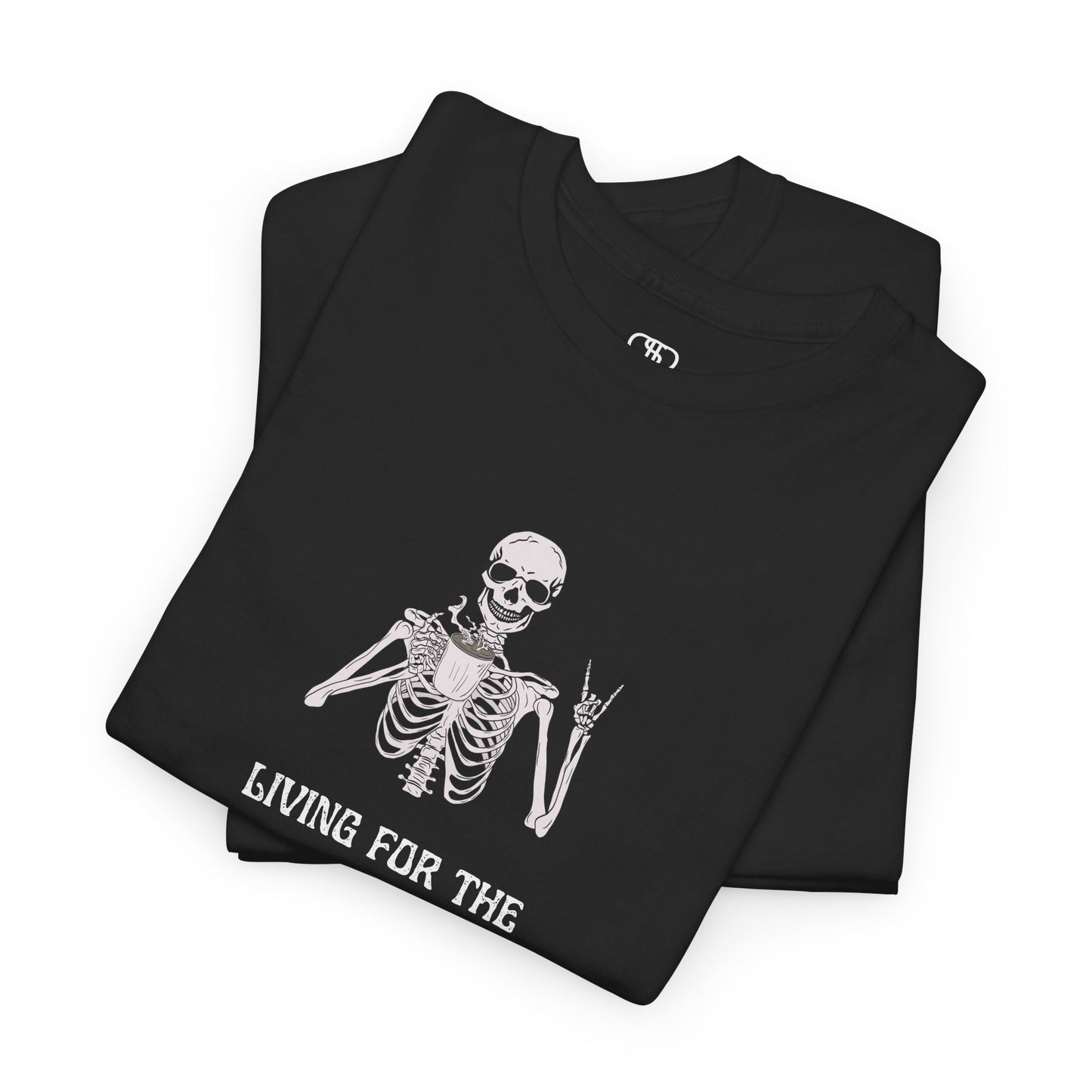  A folded black T-shirt with a skeleton holding a hot coffee, displaying a rock hand symbol, and "Living For The Coffee" text.
