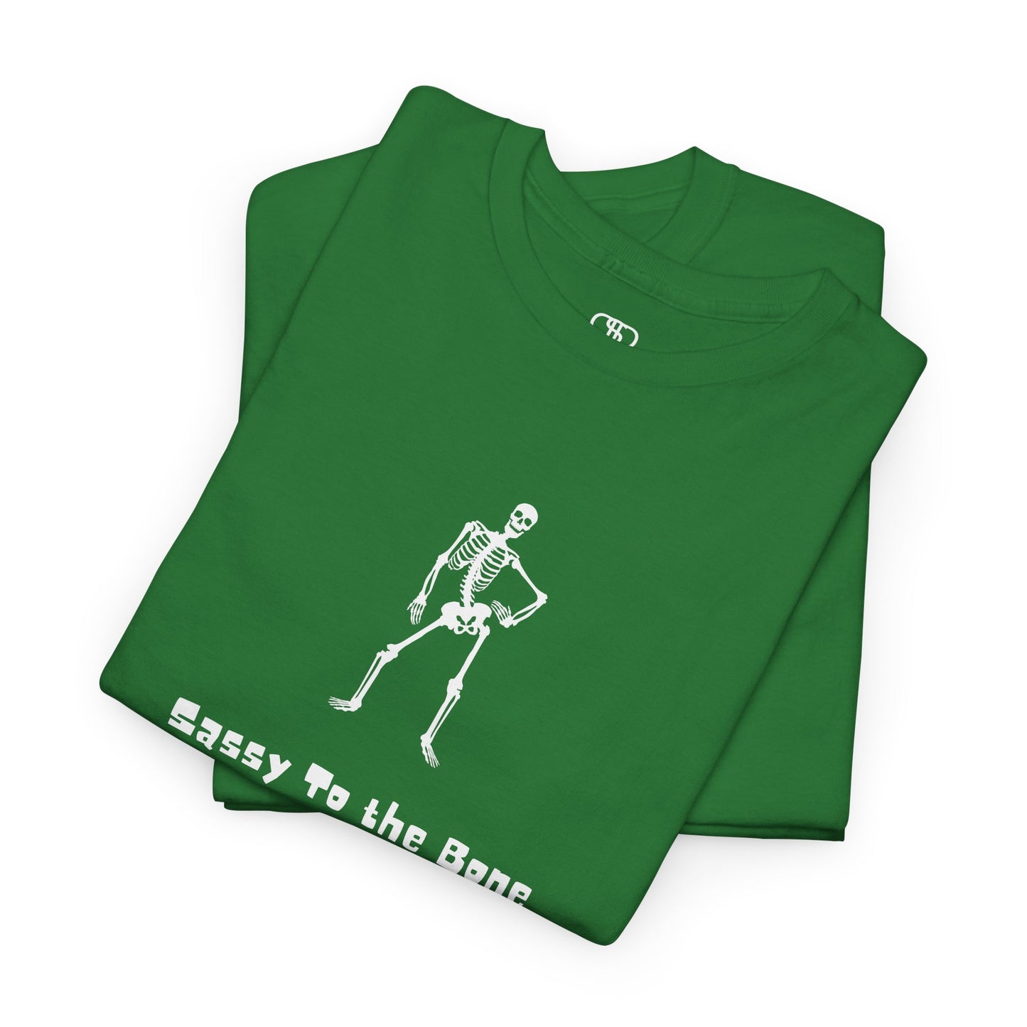 Folded Green T-shirt with a sassy skeleton graphic with hands on hips and "Sassy to the Bone" text in a cartoon font.