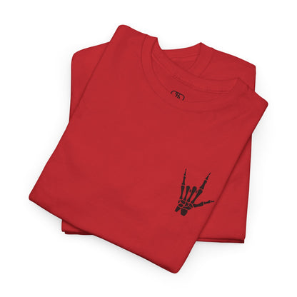 A FOLDED RED t-shirt with small rock hand symbol on front, and "Rules.. Never Heard of Them" graffiti text on the back.