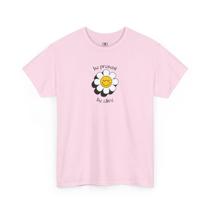 A vibrant yellow sunflower graphic on a t-shirt. The inspirational phrase “Be Present, Be Alive” is elegantly integrated into the design.
