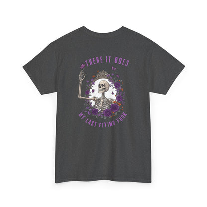 A dark heather t-shirt with a skeleton hand flipping its middle finger on the front surrounded by vines, roses, & butterflies, and a full skeleton design on the back with the phrase “My Last Flying Fuck.”