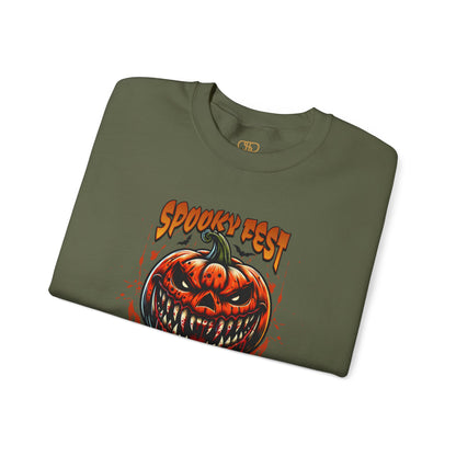 A folded heather military green sweater featuring a Scary fanged jack-o'-lantern with "Spooky Fest Halloween Your Soul Now Belongs To Me!" text, orange and black horror sweatshirt.