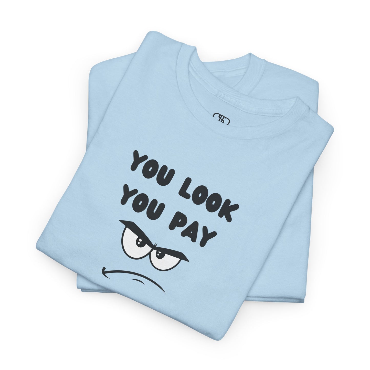 A folded light blue  T-shirt with "You Look You Pay" text and an angry cartoon graphic with scrunched eyebrows.