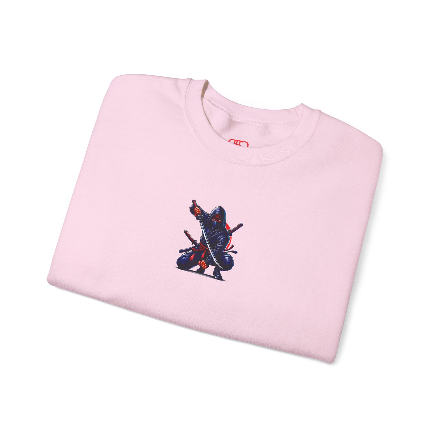 A light pink folded sweatshirt featuring a Crouching ninja with two katanas and "Bushido" text, red and black Japanese-inspired sweatshirt design.