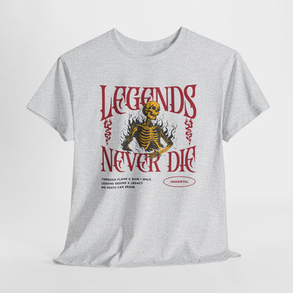 An ash gray t-shirt with a graphic of a defiant skeleton engulfed in flames. The words “Legends Never Die” are prominently displayed, with a smaller quote and the word “Immortal” included in the design.
