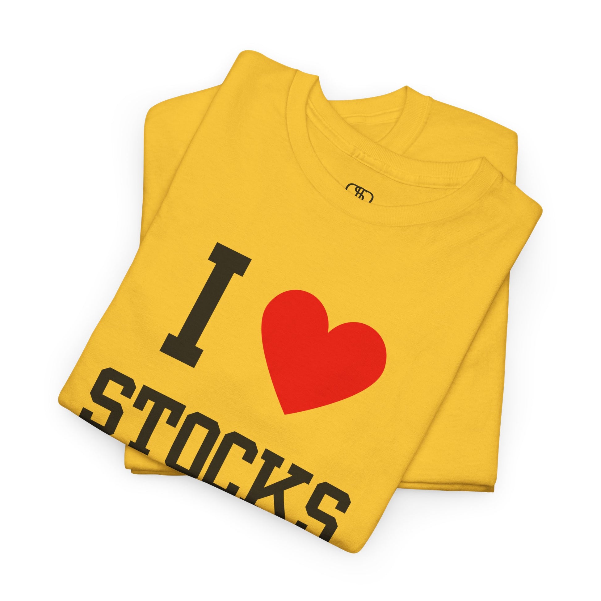 A gold folded t-shirt displaying the text "I," a red heart graphic symbolizing love, and the word "Stocks" in a classic, bold typeface.