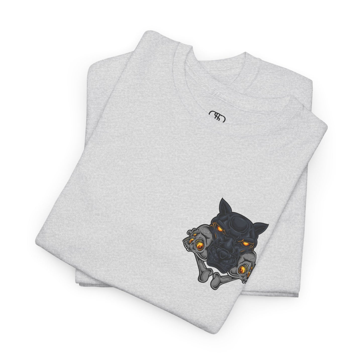 A folded ash gray T-shirt with a daring dog graphic biting two skulls, all with glowing molten lava-like eyes.