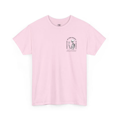 A [light pink] t-shirt with a central skeleton and rose design and the words “Perfection is the enemy of progress” and “Bloom” on the front.