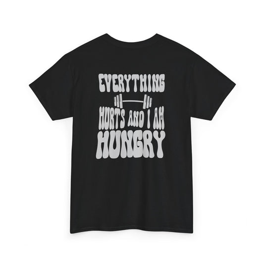  A t-shirt with a smiley face emoji on the front and the phrase “Everything Hurts and I am Hungry” in a retro font on the back.