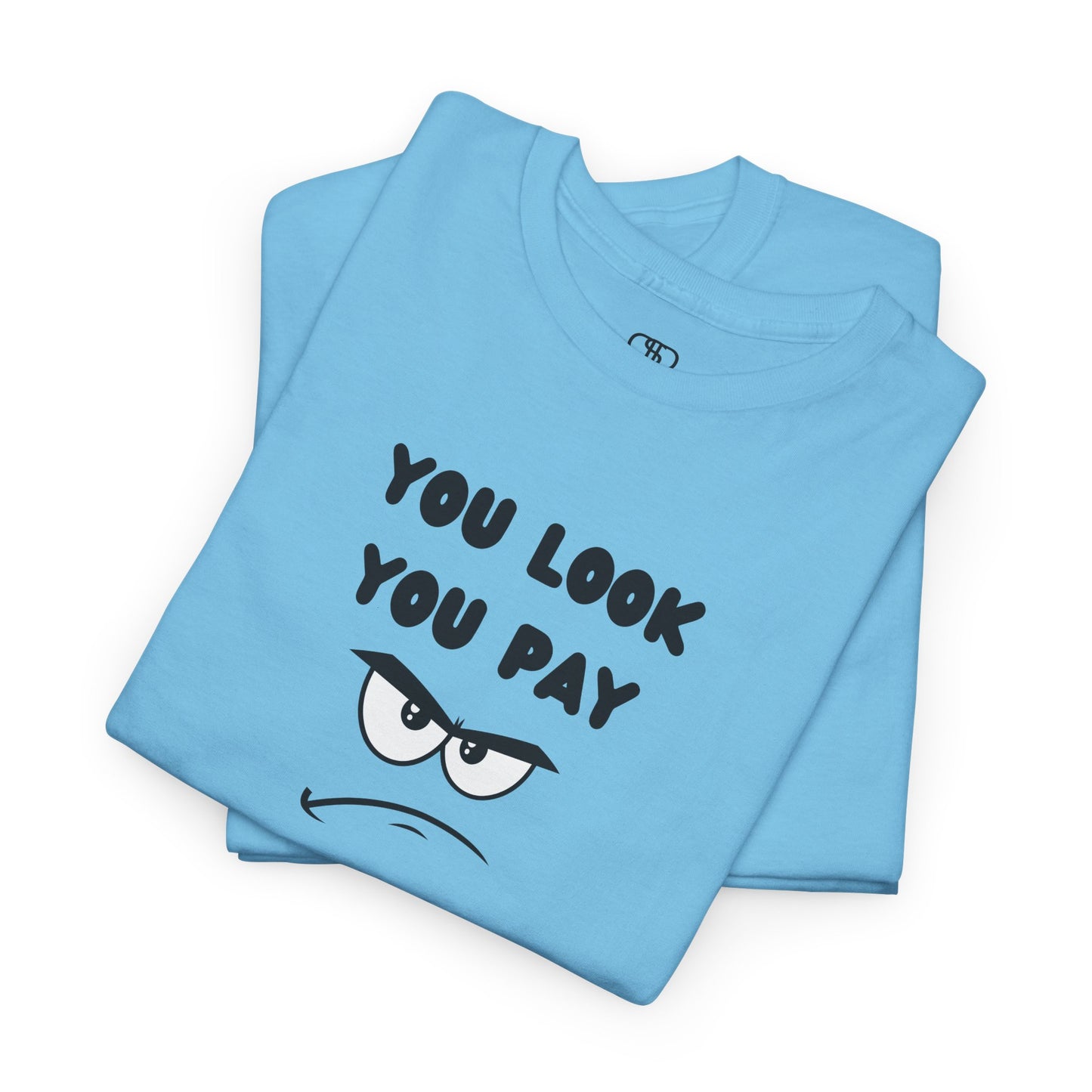 A folded sky blue T-shirt with "You Look You Pay" text and an angry cartoon graphic with scrunched eyebrows.