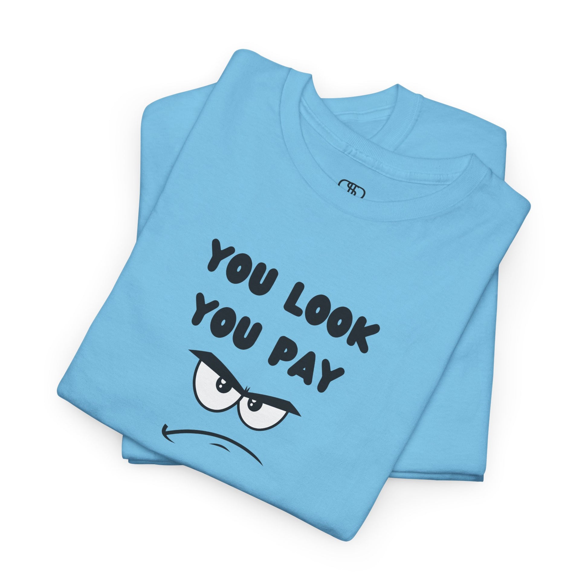 A folded sky blue T-shirt with "You Look You Pay" text and an angry cartoon graphic with scrunched eyebrows.