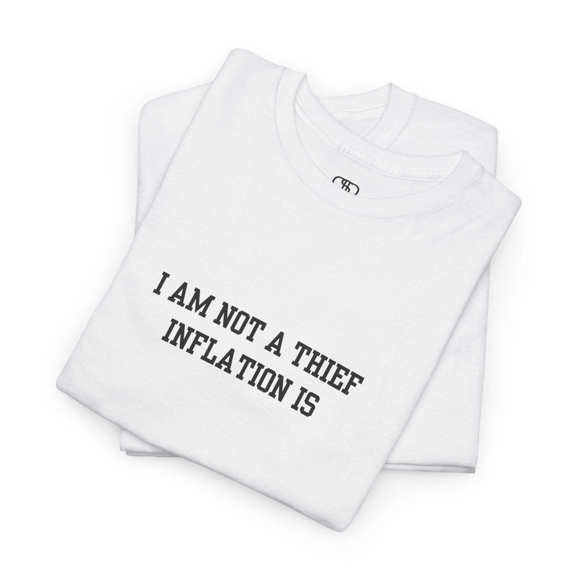 A folded white t-shirt with the phrase “I am not a thief Inflation is” on the front.