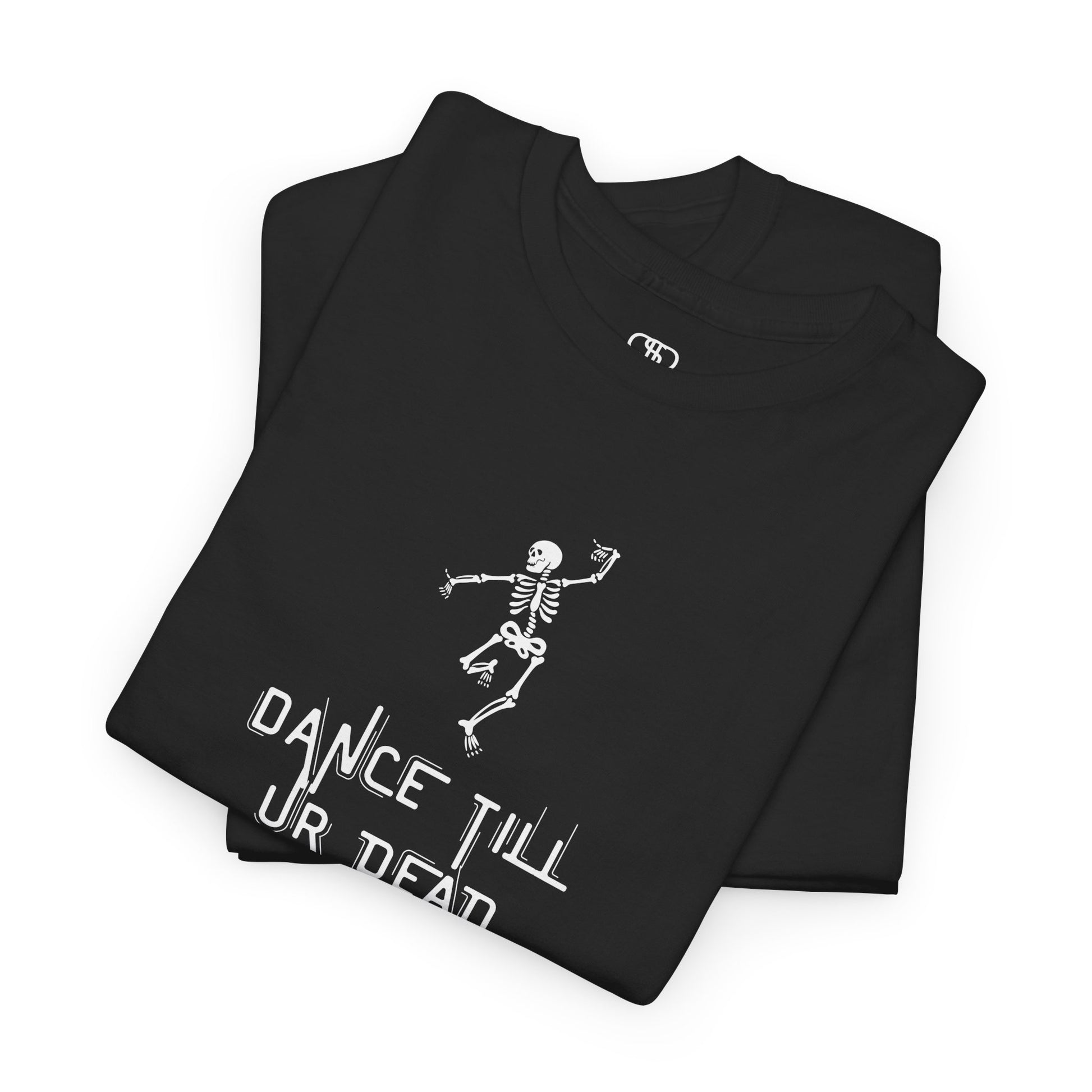 A folded black T-shirt with a dancing skeleton graphic and "Dance Till Ur Dead" text in a creative font.
