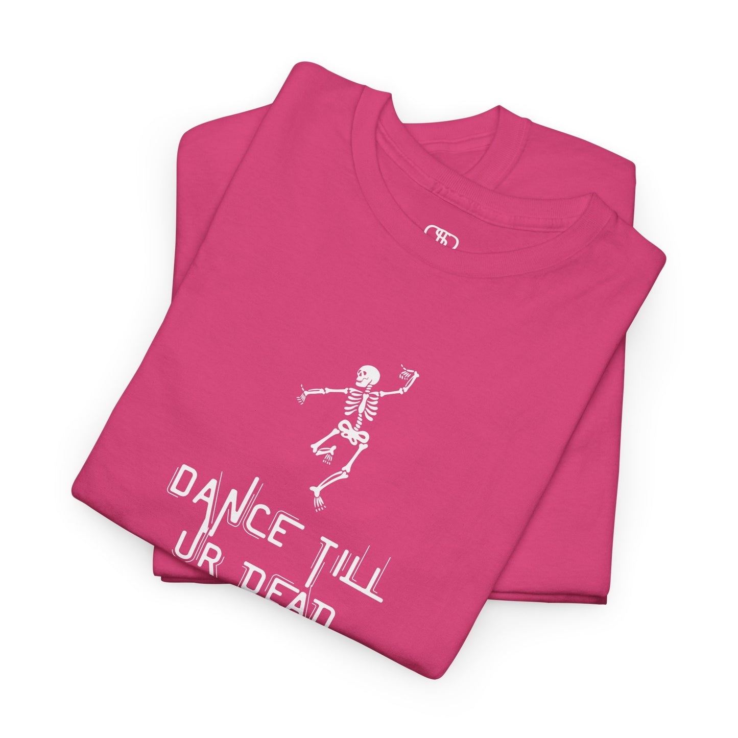 A folded Pink T-shirt with a dancing skeleton graphic and "Dance Till Ur Dead" text in a creative font.