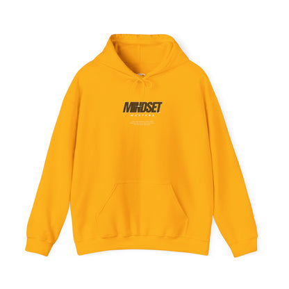 A gold hoodie "Mindset Matters" text with stars on hoodie, with an inspirational quote below.