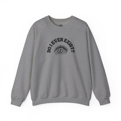 A sweatshirt with a graphic print of a detailed, realistic eye that contains an optical illusion of a spiral. The text "Do I even Exist?" is printed below the eye in a clean, sans-serif font.