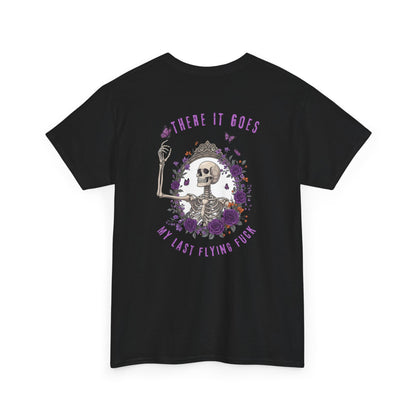 A black t-shirt with a skeleton hand flipping its middle finger on the front surrounded by vines, roses, & butterflies, and a full skeleton design on the back with the phrase “My Last Flying Fuck.”