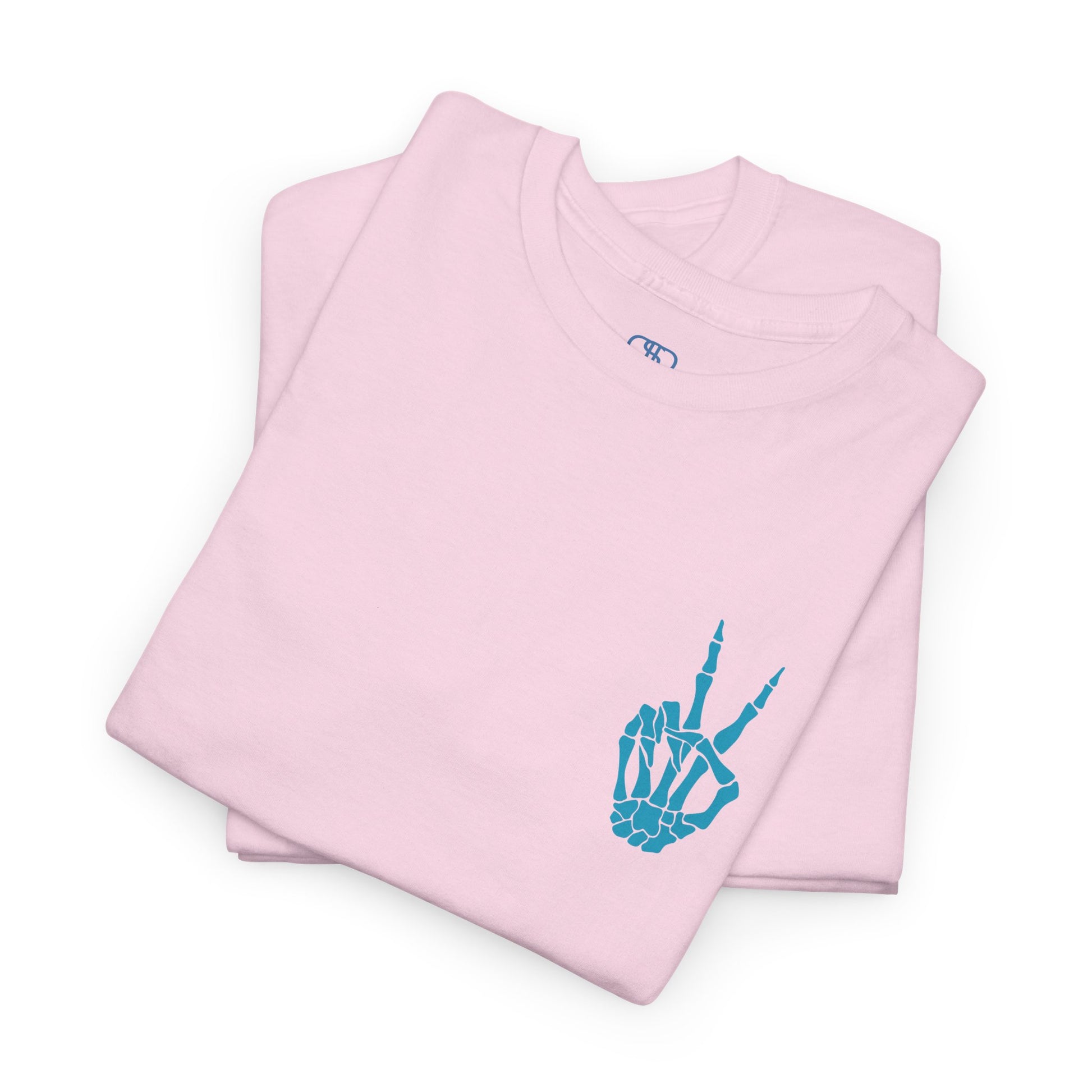 A [folded light pink] t-shirt with a skeletal peace sign on the front and the phrase “Have the day you deserve” with a large skeletal peace sign on the back.