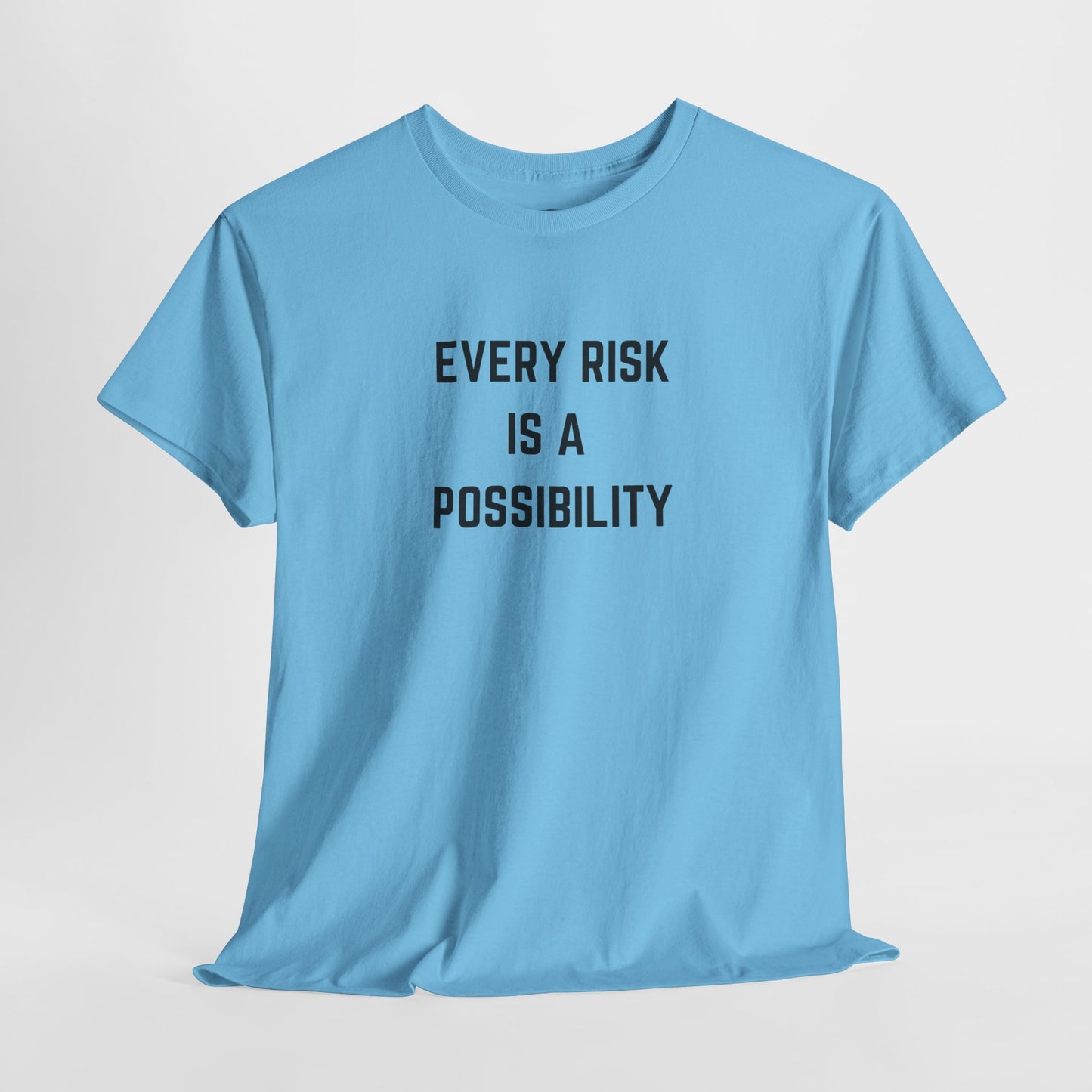  A t-shirt featuring the motivational quote "Every Risk Is a Possibility." in a clean, bold font.