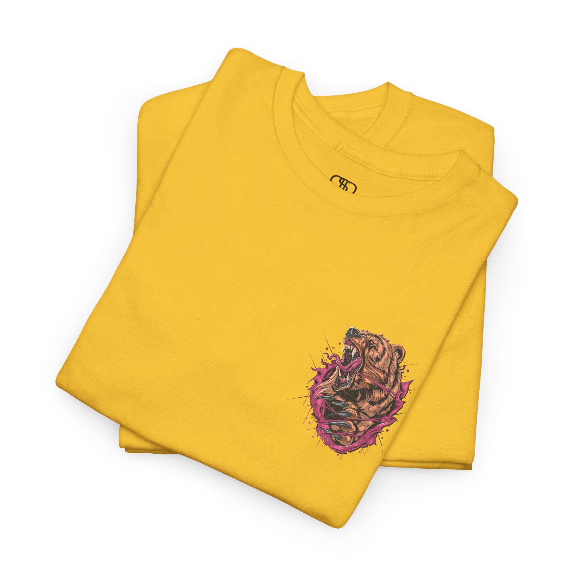 A folded daisy yellow T-shirt with a graphic of a raging bear ripping through the fabric, growling, with claws out and red eyes.