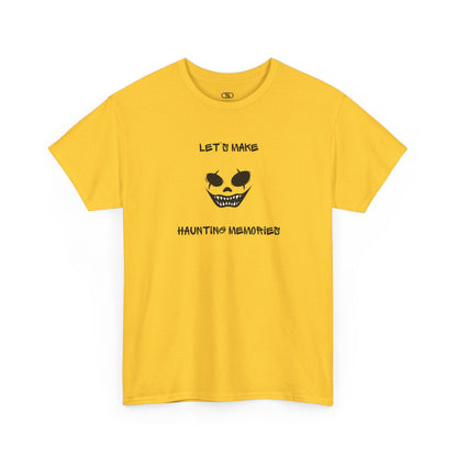 A Daisy yellow T-shirt with a daring clown graphic with sharp teeth and scars, and "Let’s Make Haunting Memories" text.
