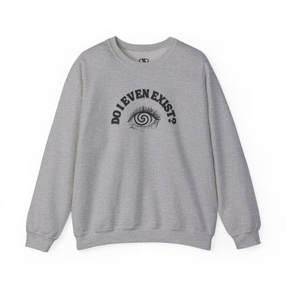 A sweatshirt with a graphic print of a detailed, realistic eye that contains an optical illusion of a spiral. The text "Do I even Exist?" is printed below the eye in a clean, sans-serif font.