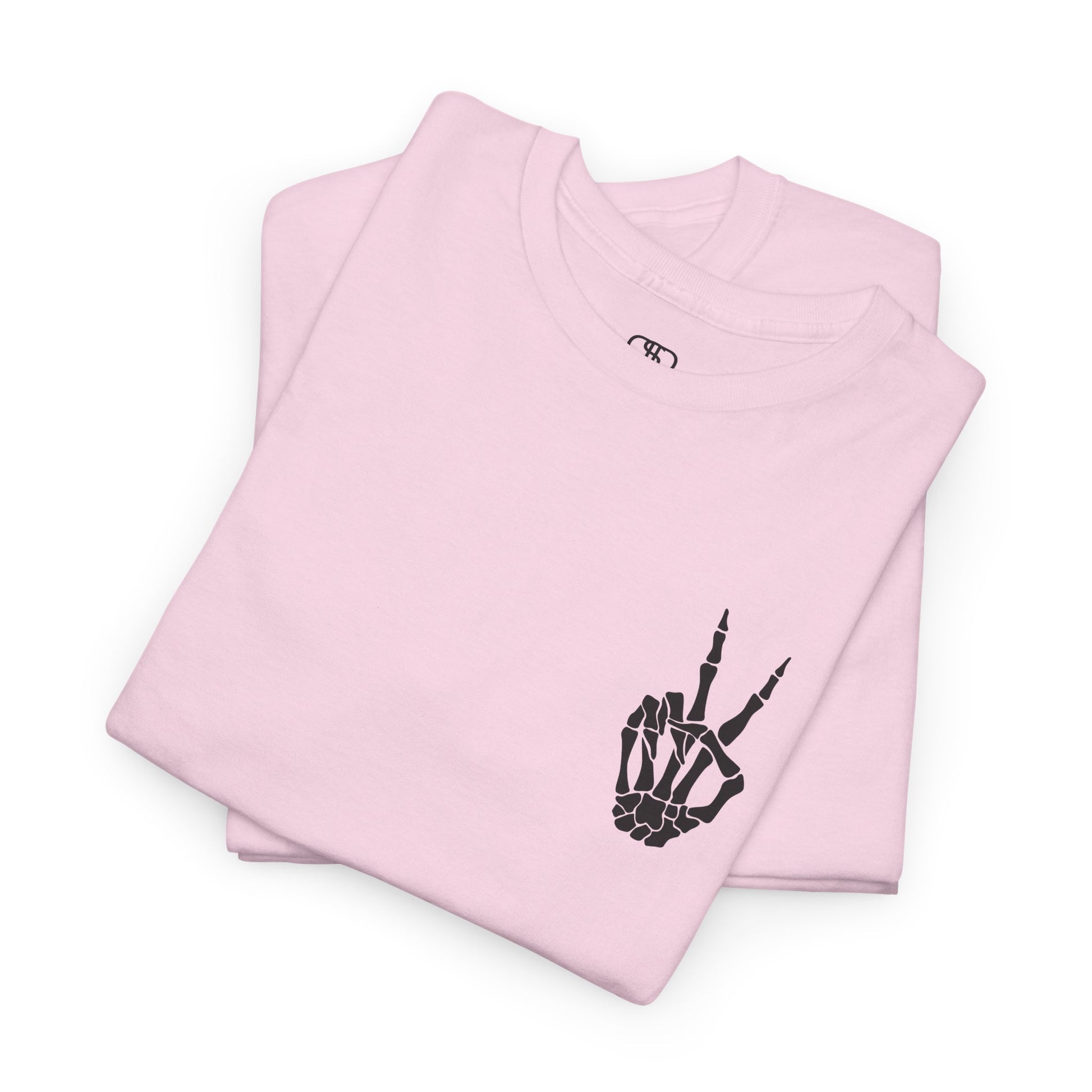 A [folded light pink] t-shirt with a skeletal peace sign on the front and the phrase “Have the day you deserve” with a large skeletal peace sign on the back.