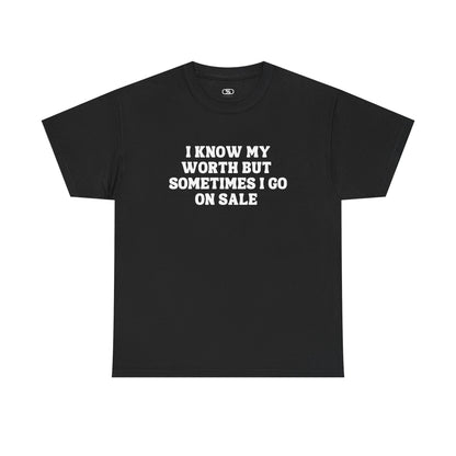 A [black] t-shirt with the funny quote "I know my worth but sometimes I go on sale" printed in a clean, black font across the chest.