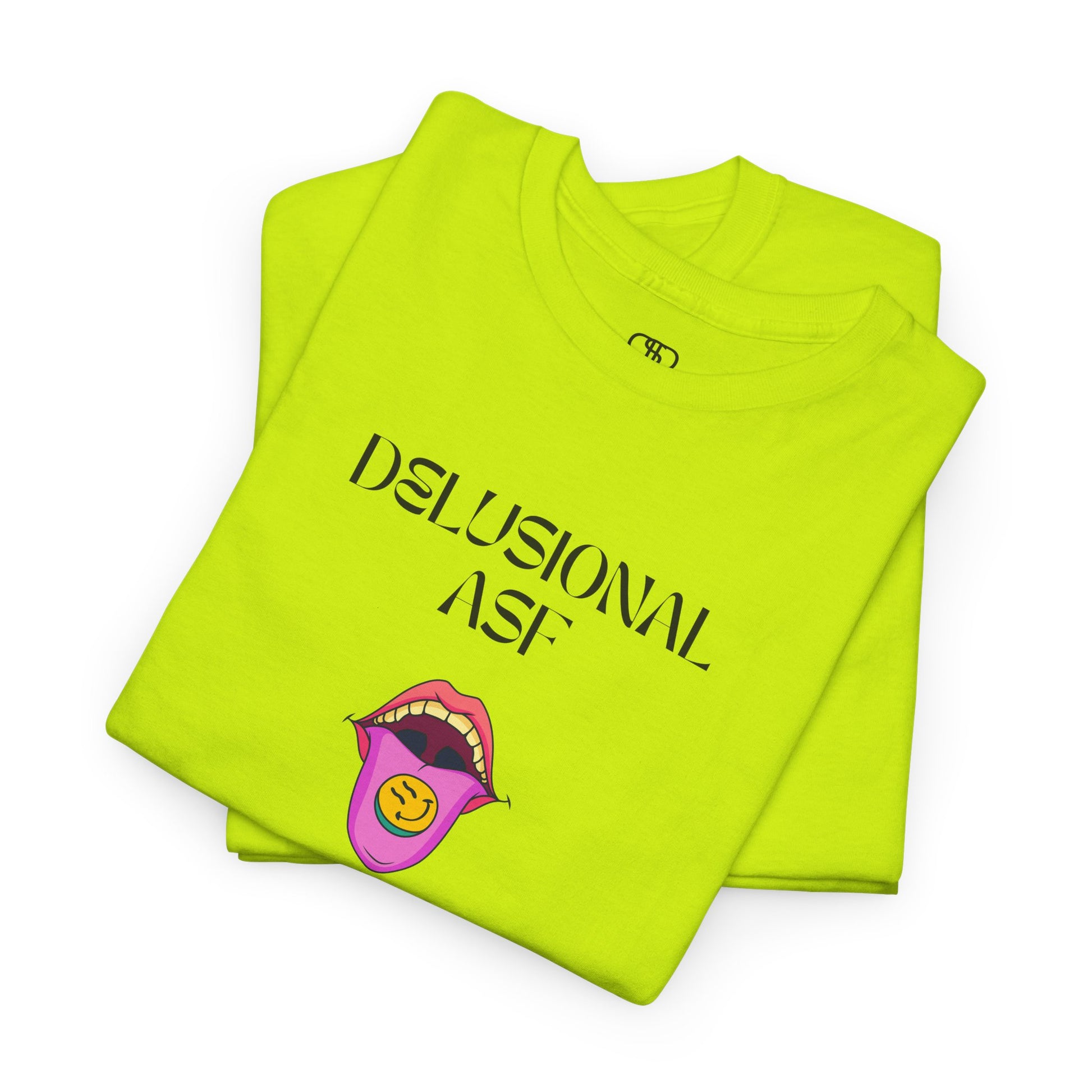 A folded safety green T-shirt with "Delusional asf" text, an open mouth graphic with tongue out, and a happy face emoji pill.