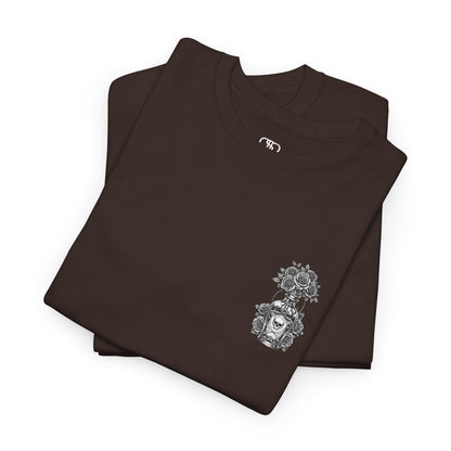 A dark brown t-shirt with a skull and crossbones vase filled with roses and the words “Surviving Purely Out of Spite” in a gothic font.