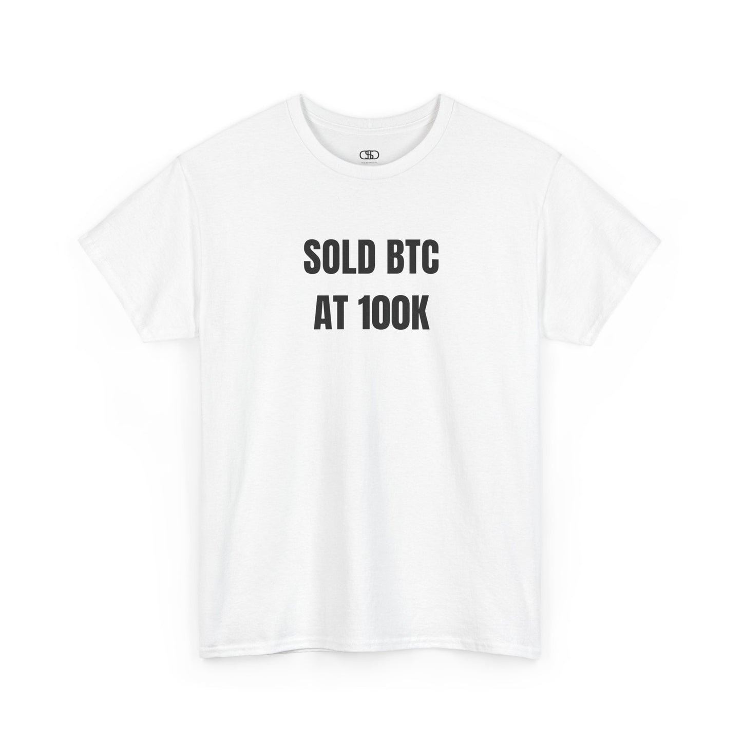 A white T-shirt with bold text "SOLD BTC At 100K" on the front.