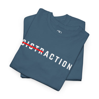 A folded minimalist t-shirt featuring the word "Distraction" with the 'Dist' part crossed out, emphasizing the word 'Action' in a bold font.