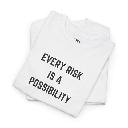  A t-shirt featuring the motivational quote "Every Risk Is a Possibility." in a clean, bold font.