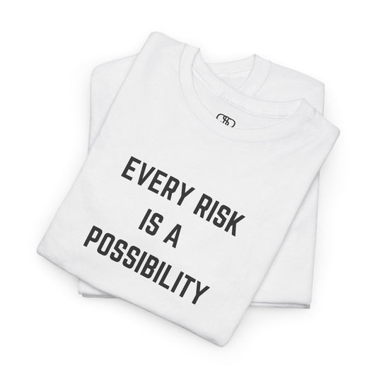  A t-shirt featuring the motivational quote "Every Risk Is a Possibility." in a clean, bold font.