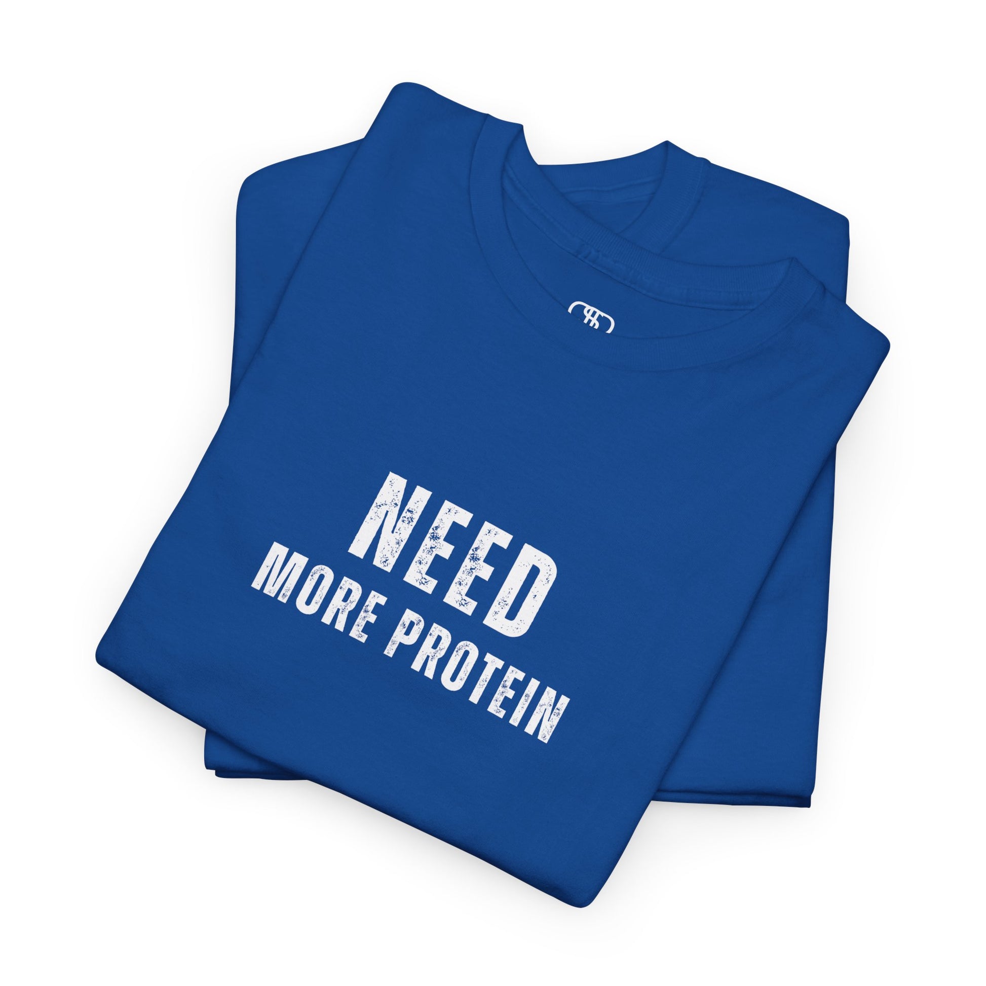 A folded royal blue t-shirt with the words “Need Protein” in a large grunge font.
