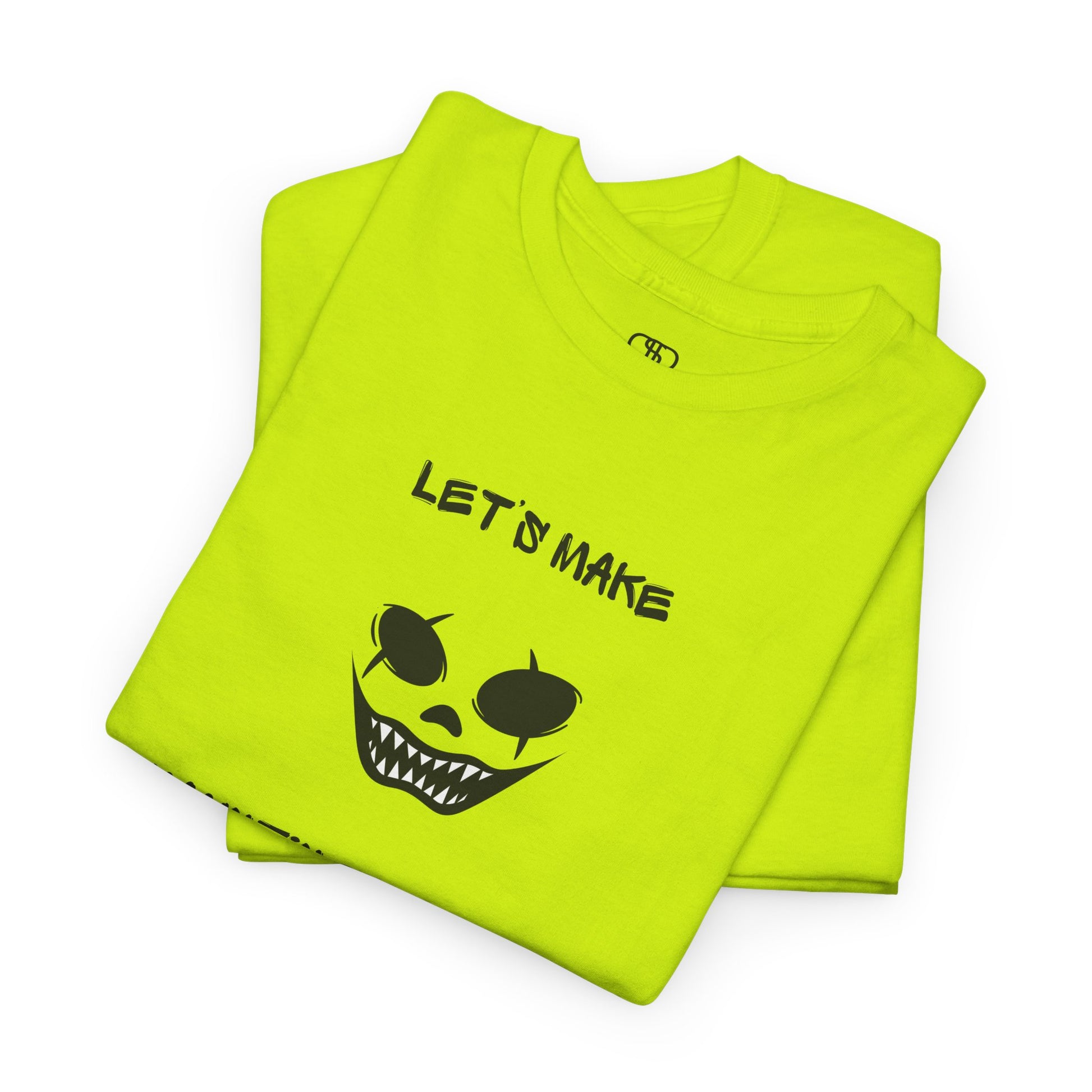 A folded safety green T-shirt with a daring clown graphic with sharp teeth and scars, and "Let’s Make Haunting Memories" text.