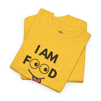 A daisy yellow folded T-shirt with "I AM FOOD" text, where the 'OO' are cartoon eyes, and a tongue-out graphic.