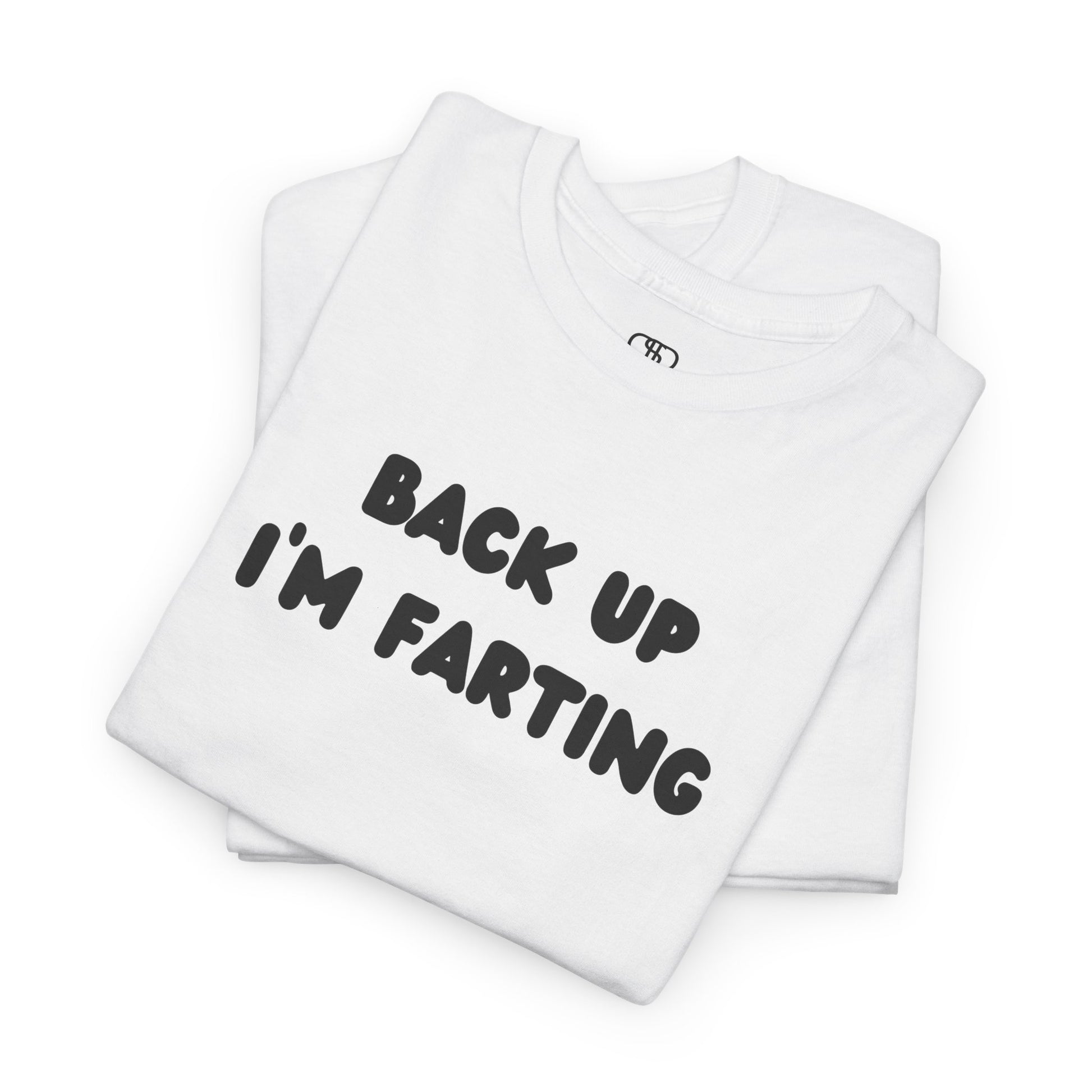 A folded white T-shirt with the bold text "Back Up I'm Farting" on the front.